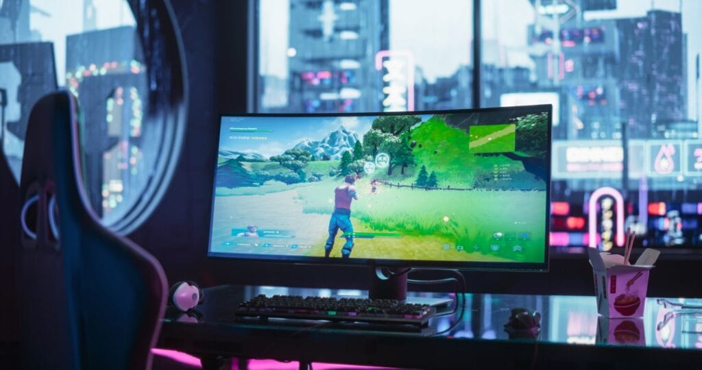 Ajustabilitatea monitorului: esențială pentru sesiuni lungi de gaming Monitor de gaming ultra-wide într-un setup ergonomic, optimizat pentru confort maxim.