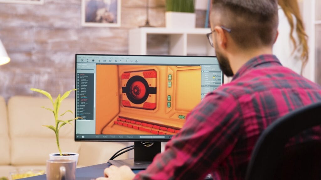 Ergonomie în fața ecranului: Cum alegi monitorul potrivit Bărbat lucrând la un monitor ajustabil ergonomic în birou modern